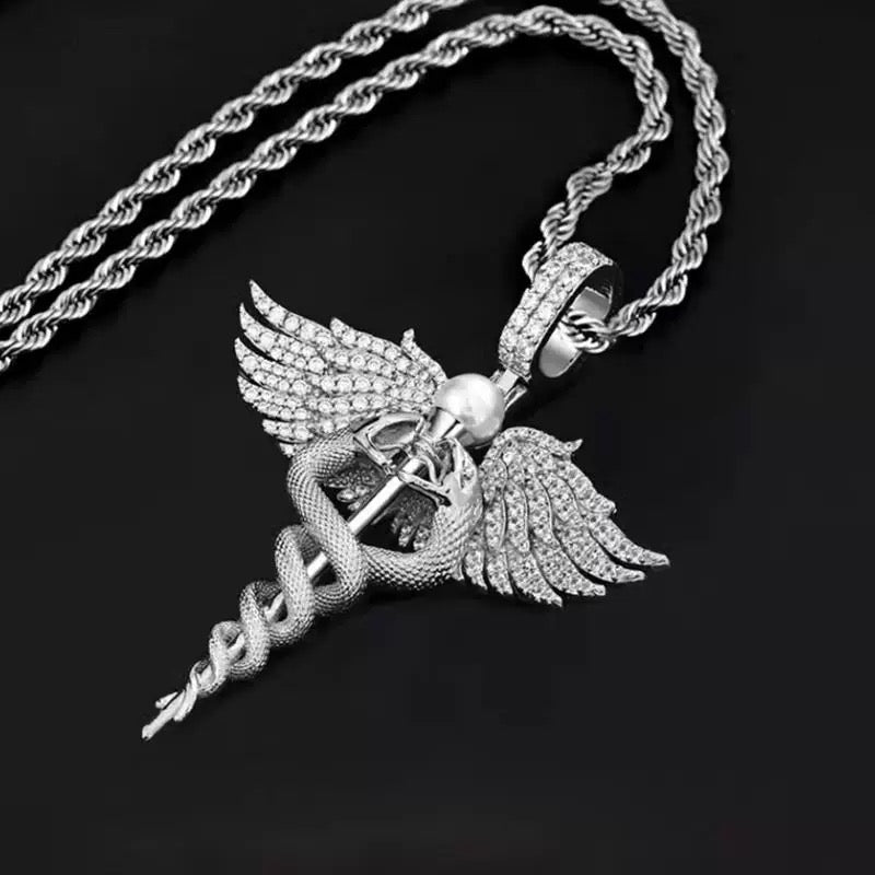 Colgante de serpiente de cobre y circón