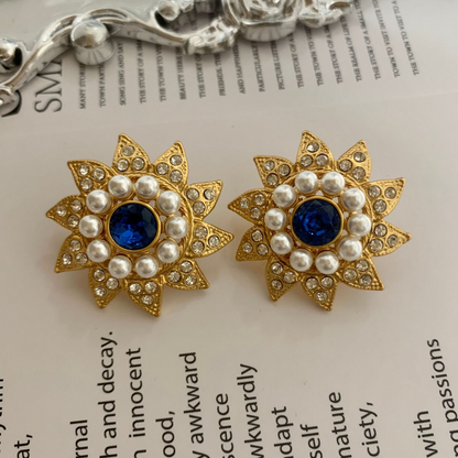 Pendientes de piedras preciosas azules de girasol