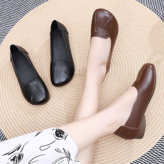 Zapatos cómodos de cuero con suela blanda y punta redonda