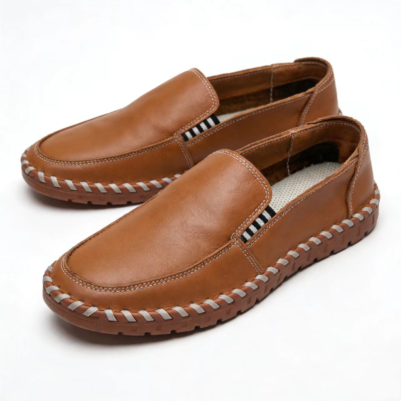 Mocasines de piel con costura artesanal perimetral para hombre